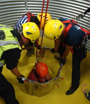 Photo is Network staff participating in the grain safety rescue training.